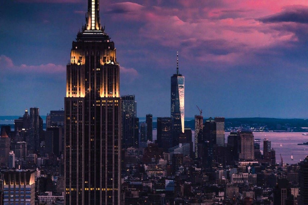 Empire State Building illuminated at dusk in New York City.