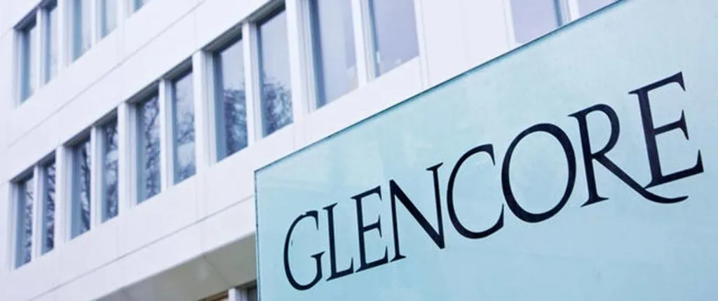 Modern corporate office building with Glencore signage in Zurich.