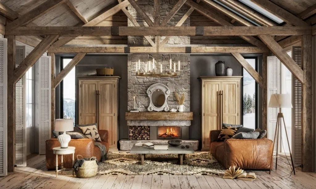Cozy rustic living room with stone fireplace and wooden beams, mountain home decor.