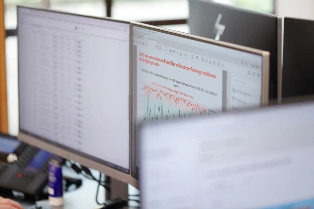Trading screens showing portfolio performance and diversification charts