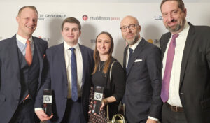 Photo of the Alpen Partners Team receiving an award