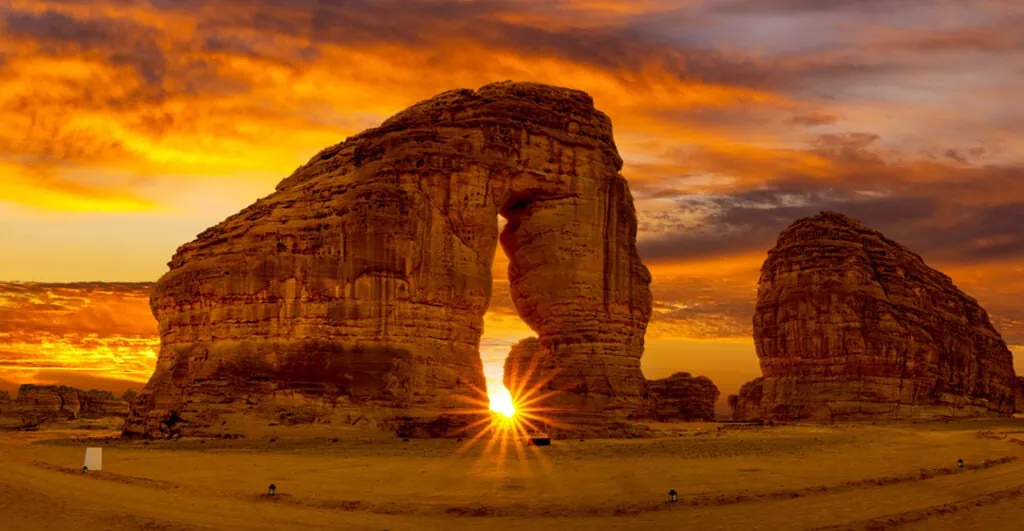 Majestic desert landscape with rock formations at sunset in Oman.